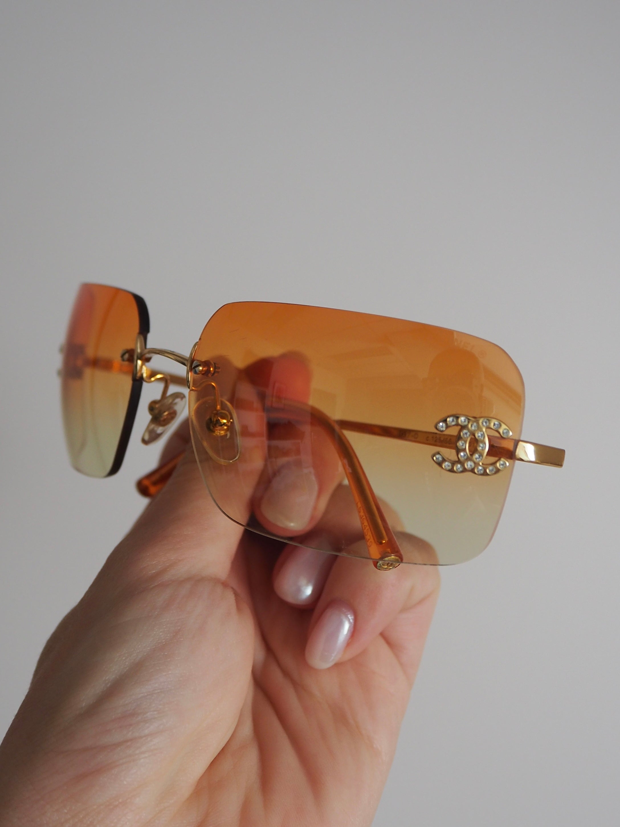 CHANEL 4017-D CRYSTAL CC LOGO RIMLESS SUNGLASSES ORANGE